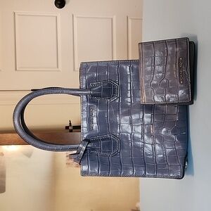 Well loved blue Michael Kors handbag‎ and matching wallet